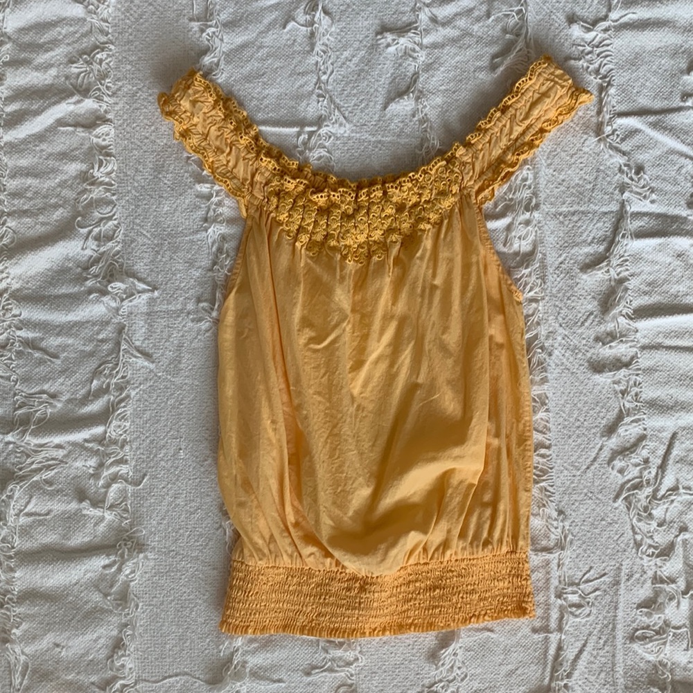 Yellow eyelet sleeveless ruffle top